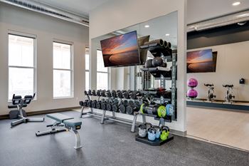 24/7 Gym with strength & cardio equipment